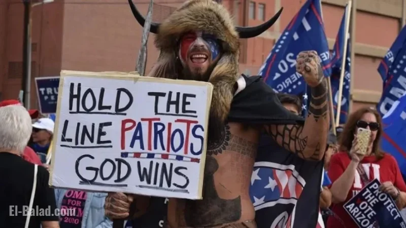‘QAnon Shaman Sues Trump for $40 Trillion to Change America’