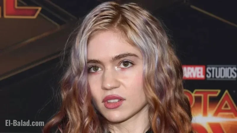 Grimes Unveils Face Tattoo, Faces Harsh Criticism for Fungus Resemblance