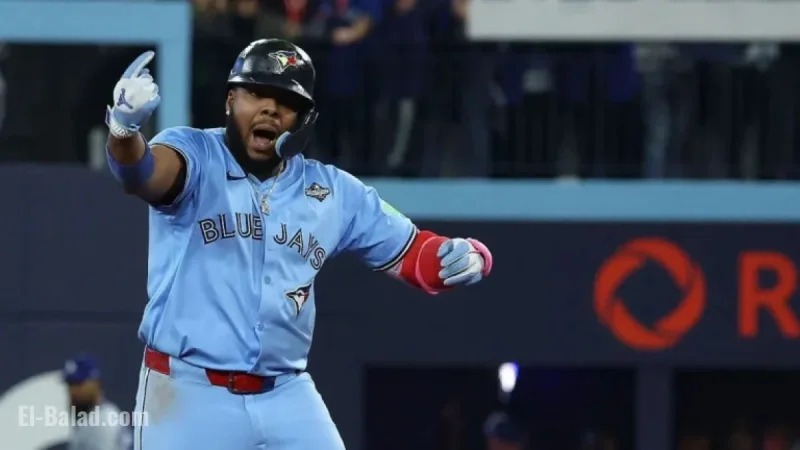 Vladimir Guerrero Jr. Sports “Captain Clutch” Poulin Jersey at World Series Finale
