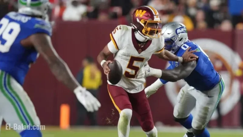 Commanders’ QB Daniels Exits Game with Apparent Elbow Injury