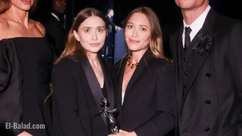 Olsen Twins Make Rare Joint Appearance in Matching Outfits for Award Ceremony