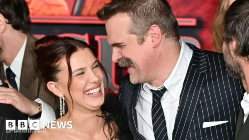 Millie Bobby Brown, David Harbour Embrace at Stranger Things Premiere