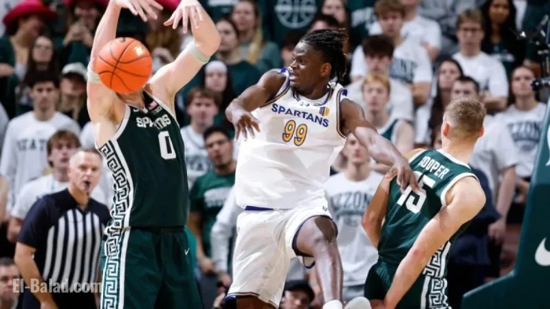Tom Izzo Reacts as Michigan State Towers Dominate with 34 Points, 25 Rebounds