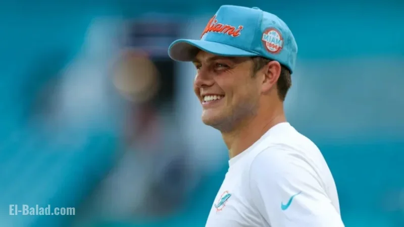 Zach Wilson’s Wife Nicolette Wows in Sleeveless Dolphins Top During Buffalo Win