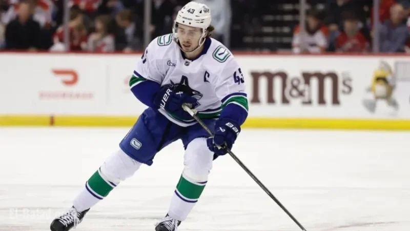 Canucks’ Quinn Hughes Faces Game-Time Decision Against Lightning