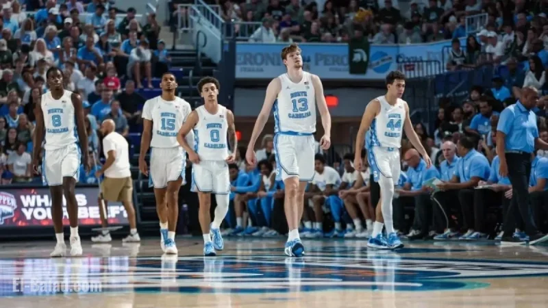 Lucas Critiques North Carolina Athletics in “Two Much”