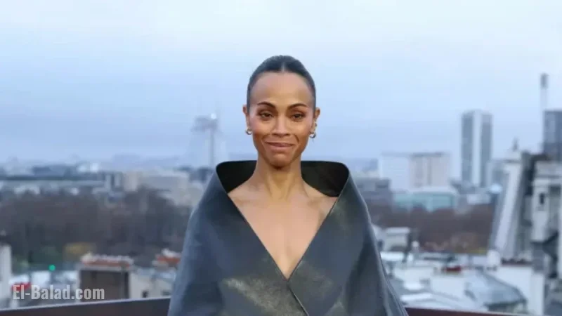 Zoe Saldaña Elevates Fashion with Chic Funnel Neck Coat