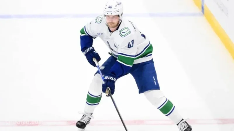 Canucks’ Elias Pettersson Sidelined by Upper-Body Injury Against Wild