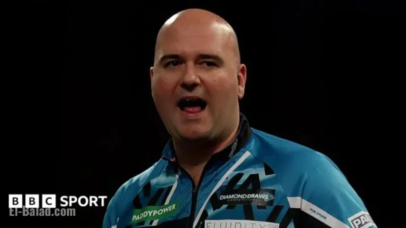 Rob Cross and Ryan Searle Advance to World Darts Championship Round Two