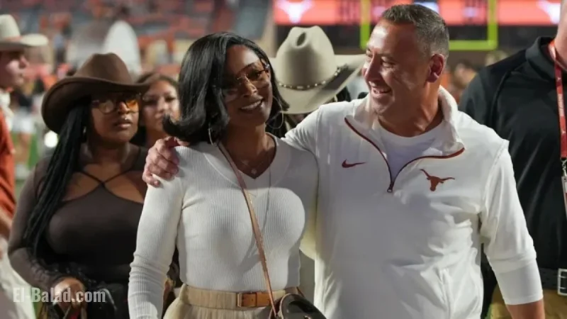 Loreal Sarkisian Dazzles in Bold Burnt Orange Texas Outfit at Citrus Bowl