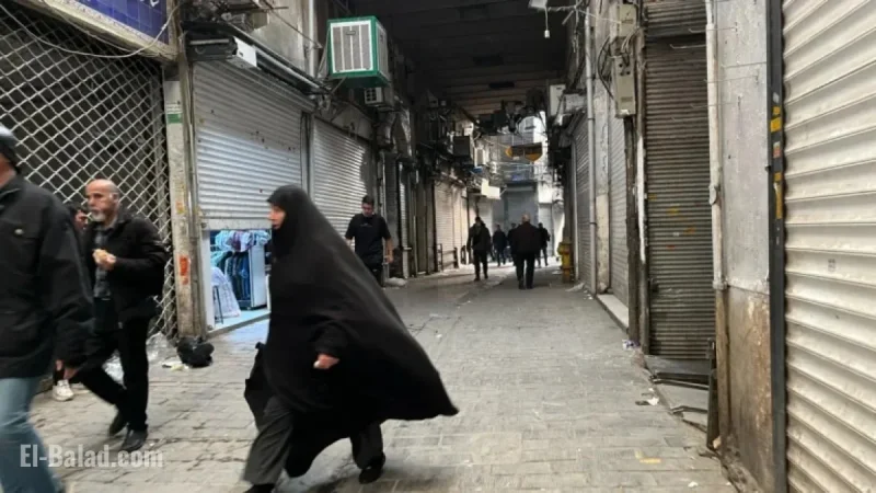 Iranian Security Forces Clash with Protesters in Main Market
