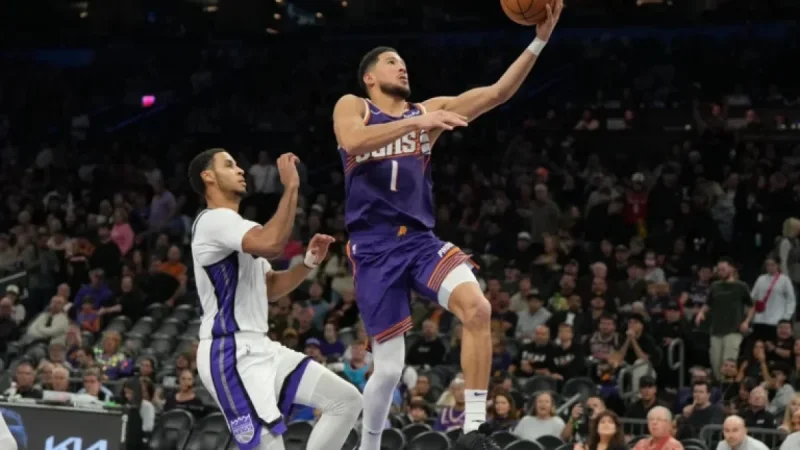 ESPN’s Tim Bontemps Advocates for Devin Booker’s All-Star Inclusion