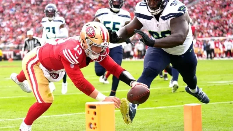 Brock Purdy Leads 49ers in Pursuit of Upset Against Seahawks