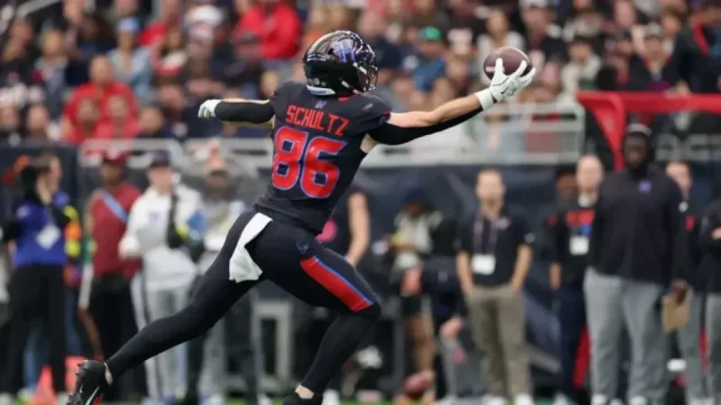 Texans’ TE Dalton Schultz Suffers Calf Injury in Playoff Against Patriots