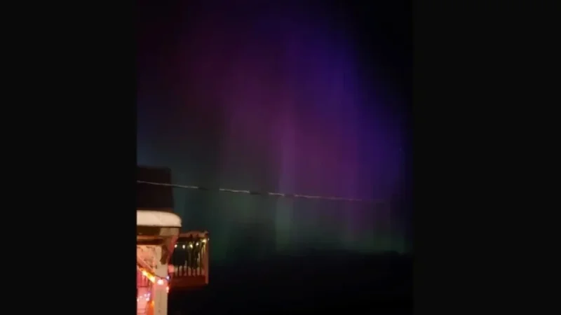 Northern Lights Illuminate Sky with Deep Purples and Greens Today