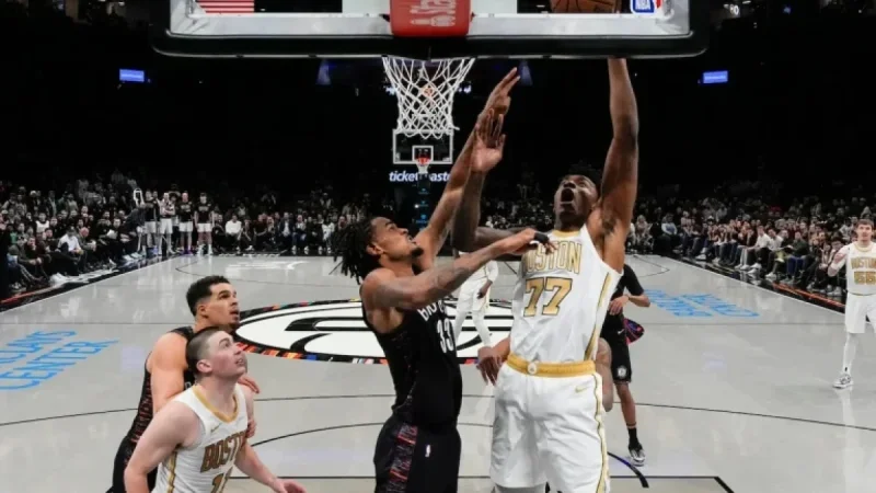 Celtics’ Two-Way Center Shines in Overtime Victory Against Nets