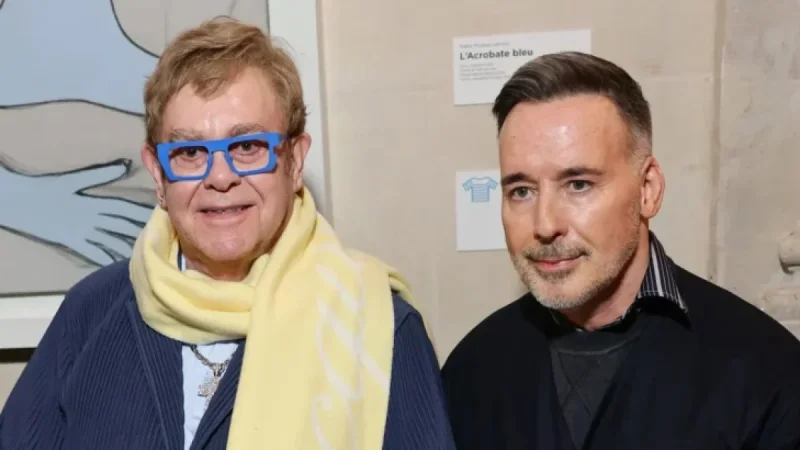 Elton John and David Furnish Attend Jacquemus Show at Paris Fashion Week