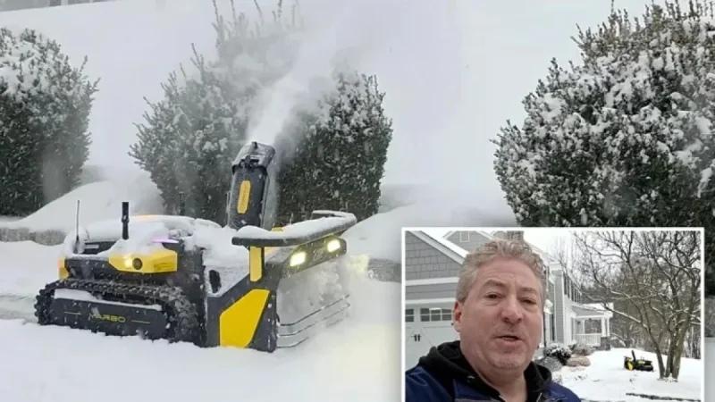 NJ Man Relaxes as $5K Robotic Snow Blower Clears Driveway in Storm Fern