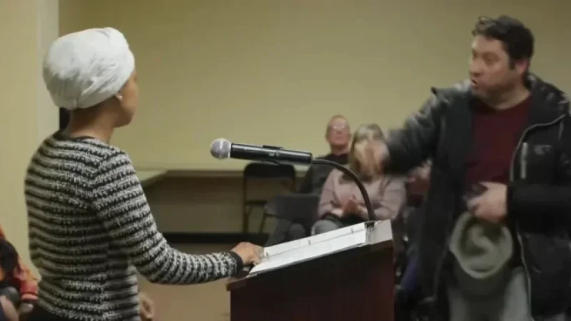 Assailant Attacks Rep. Ilhan Omar with Substance at Town Hall