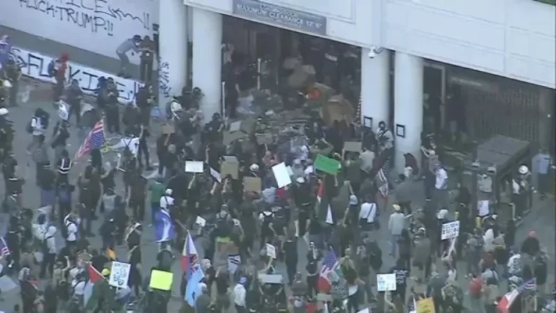 Protesters Clash with Police in Downtown LA ‘ICE Out’ Demonstration