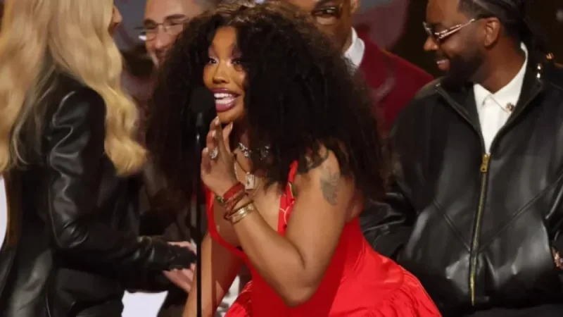 SZA Stuns at 2026 Grammys in Bold Red Plunging Dress