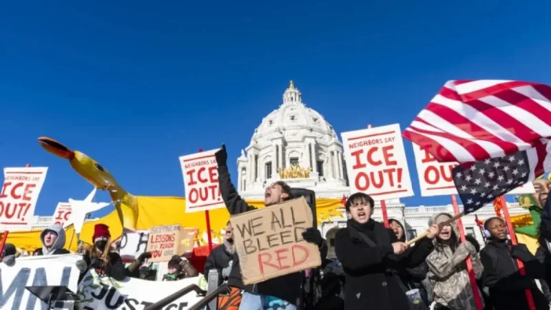 Red and Blue States Intensify Standoff Over Immigration Enforcement