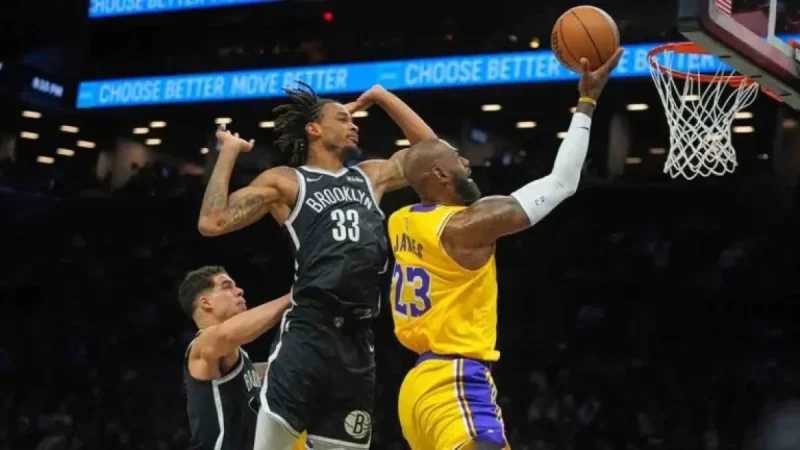 Doncic and James Lead Lakers to Victory Over Nets as Reaves Returns