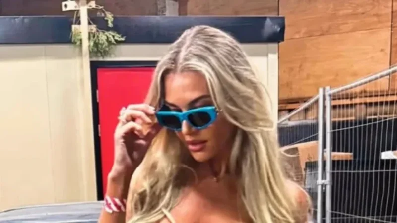Christine McGuinness Stuns in PVC Hotpants, Plunging Top, and Fishnet Tights