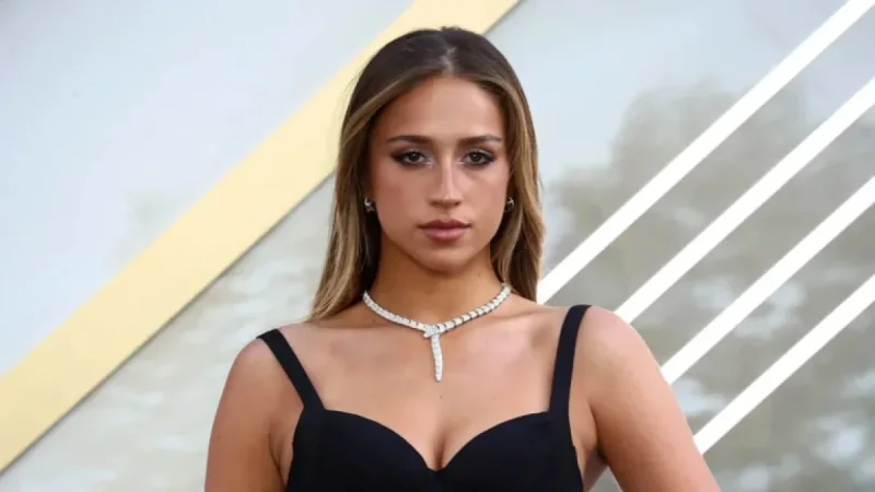 Tate McRae Captivates in Victoria’s Secret Dress at Olympics with Jack Hughes