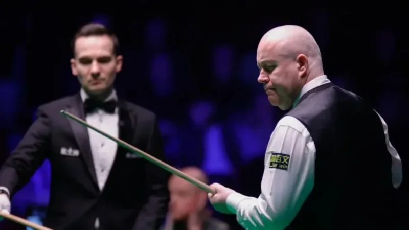 Higgins Defeats Wakelin to Reach Semifinals