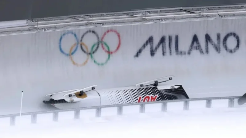 Olympic 4-Man Bobsled: Three Sleds Tip at Same Turn