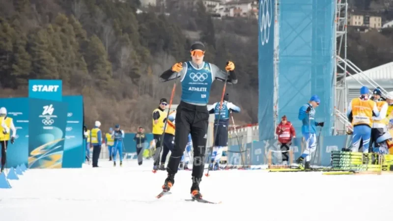 Iulian Luchin Leads Moldova as Flag Bearer at Winter Olympics Closing Ceremony