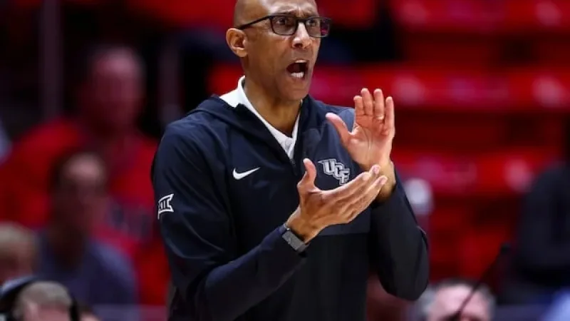 UCF Coach Johnny Dawkins Celebrates Upset Victory Against BYU