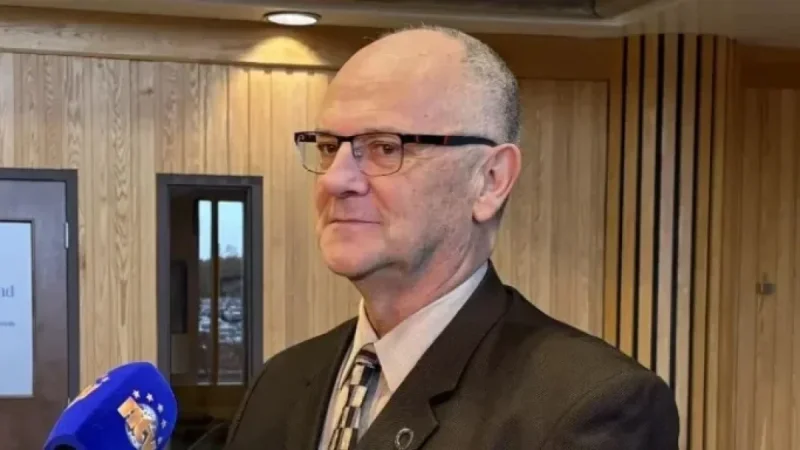 Minister Addresses PA System Challenges at New World Island Academy