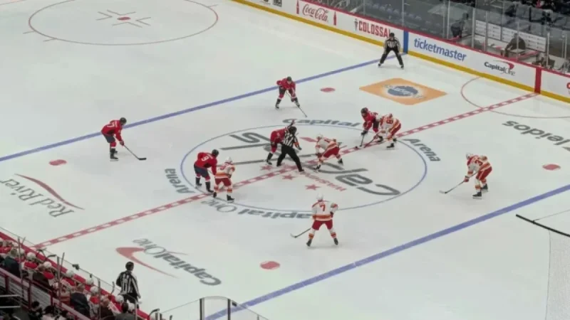 Capitals Overpower Flames 7-3 in High-Scoring Victory