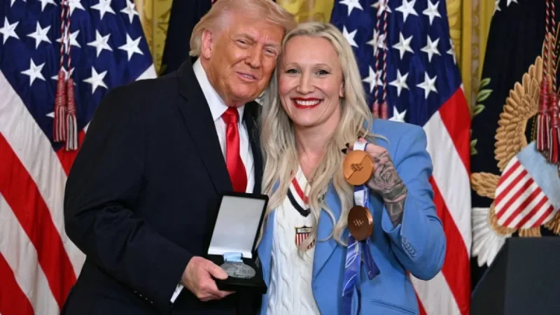 Kaillie Humphries hands a rare honor to Trump, and turns a medal into a message