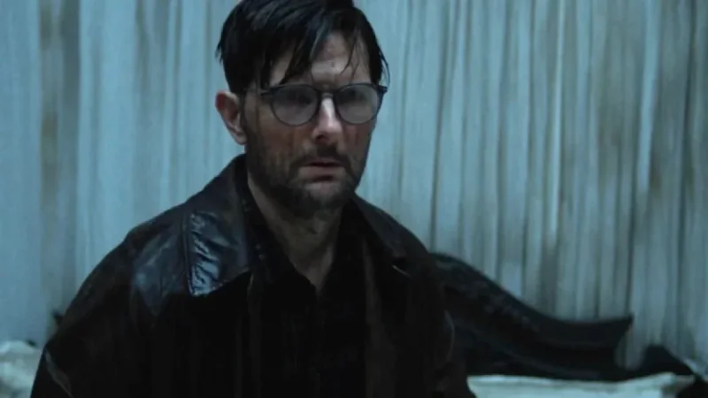 Adam Scott faces a new horror inflection point as the ‘Hokum’ trailer raises the stakes