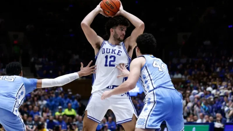 Carlos Boozer as awards roll in for Cameron Boozer after a breakout season