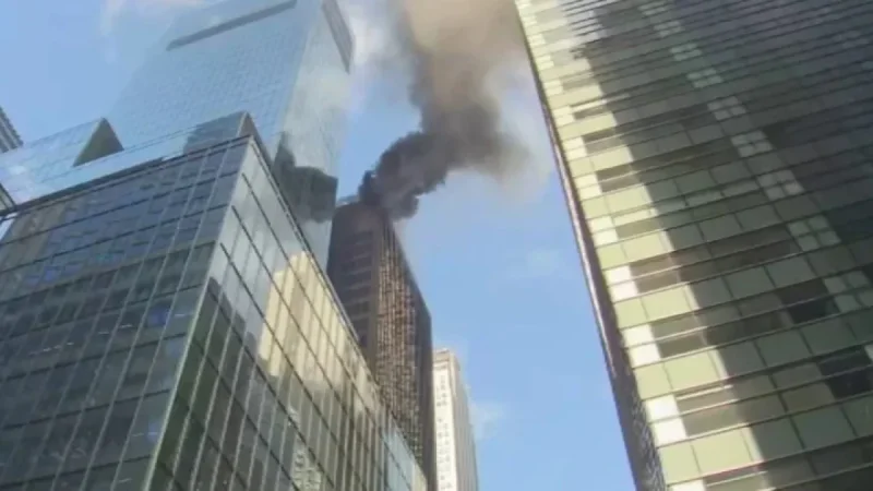 Midtown Fire raises parade-day safety questions as smoke pours from a high-rise roof