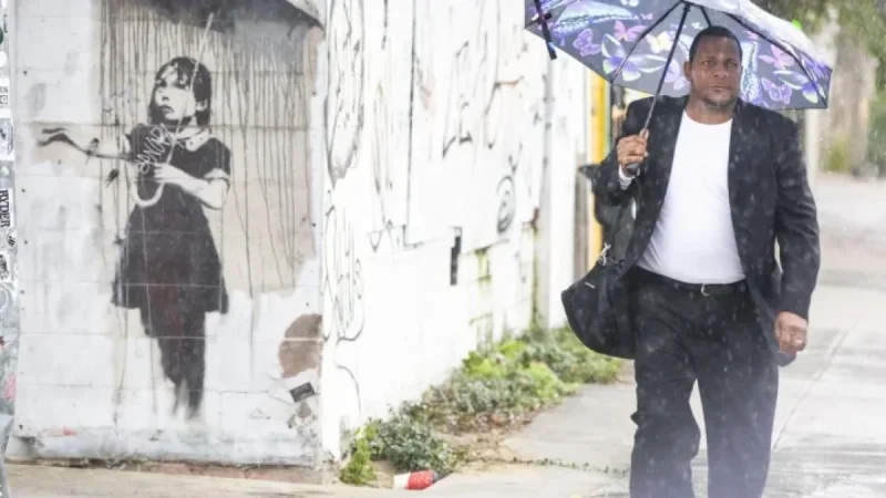 Artist Banksy: The “Unmasking” That Collides With a Museum Display and a City’s Fight to Keep the Art in Place