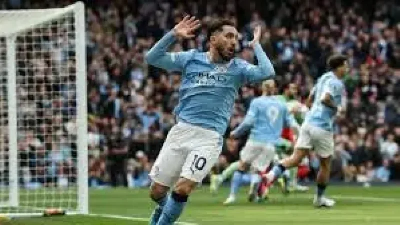 Arsenal.score swings in wild Manchester City-Arsenal title decider