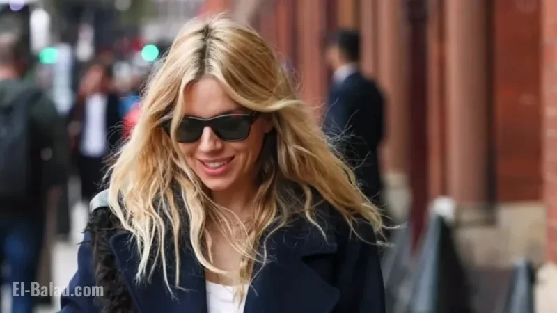 Sienna Miller Elevates High Street Fashion with Chic Coat and Jeans Ensemble