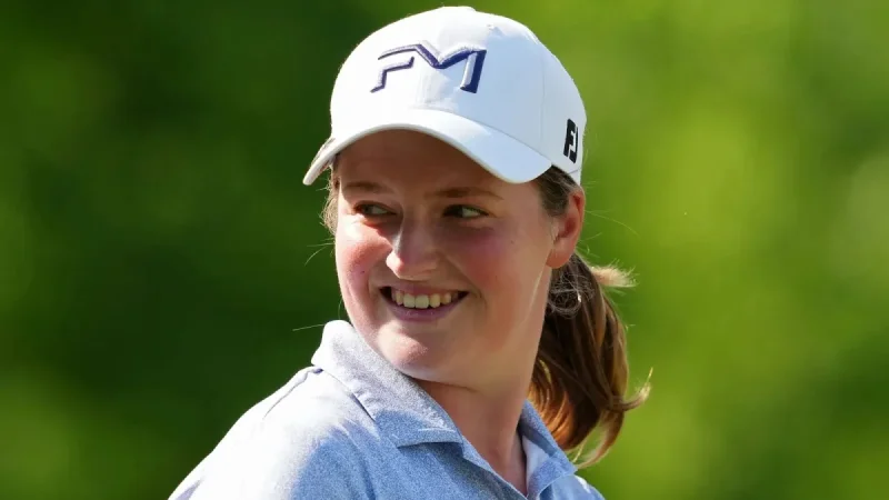 Lottie Woad Leads By Three After 65 at Queen City