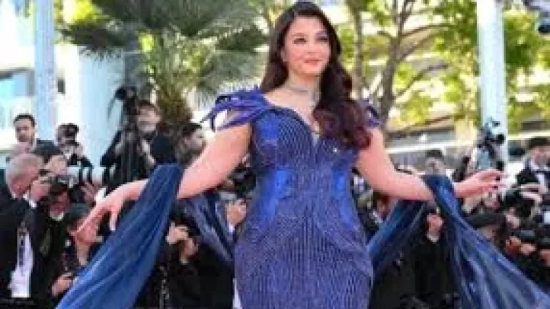 Aishwarya Rai Arrives in Cannes in Metallic Blue Dress