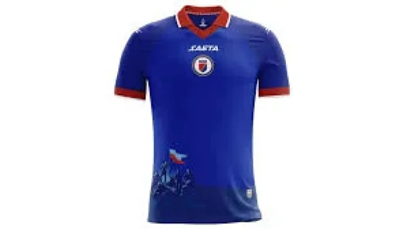 Danley Jean Jacques shows Haiti's plainer World Cup shirt