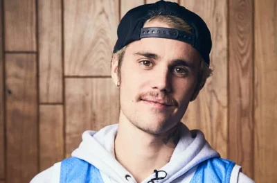 Justin Bieber kisses Hailey Bieber as Knicks end 53-year title wait