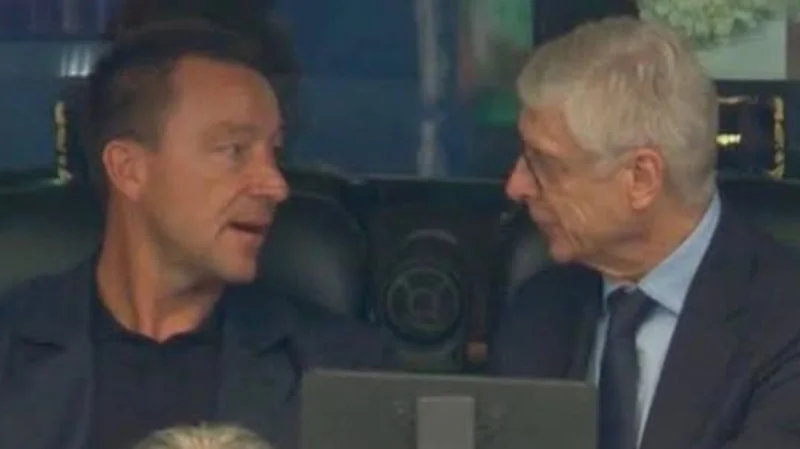 Arsène Wenger and John Terry spotted talking during England's 4-2 win