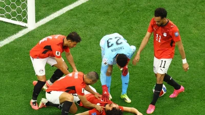 Mohamed Hany goes down after block in Egypt v Australia