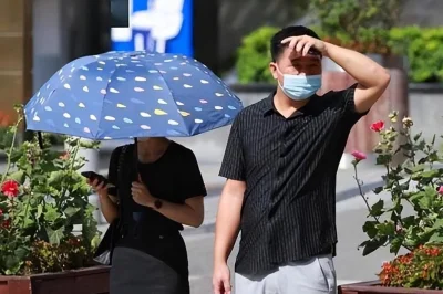 Lan Yunxia says 84 degrees at Flaming Mountains in Xinjiang Weather