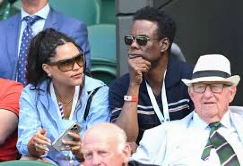 Chris Rock appears with Simone Henault at Wimbledon day four